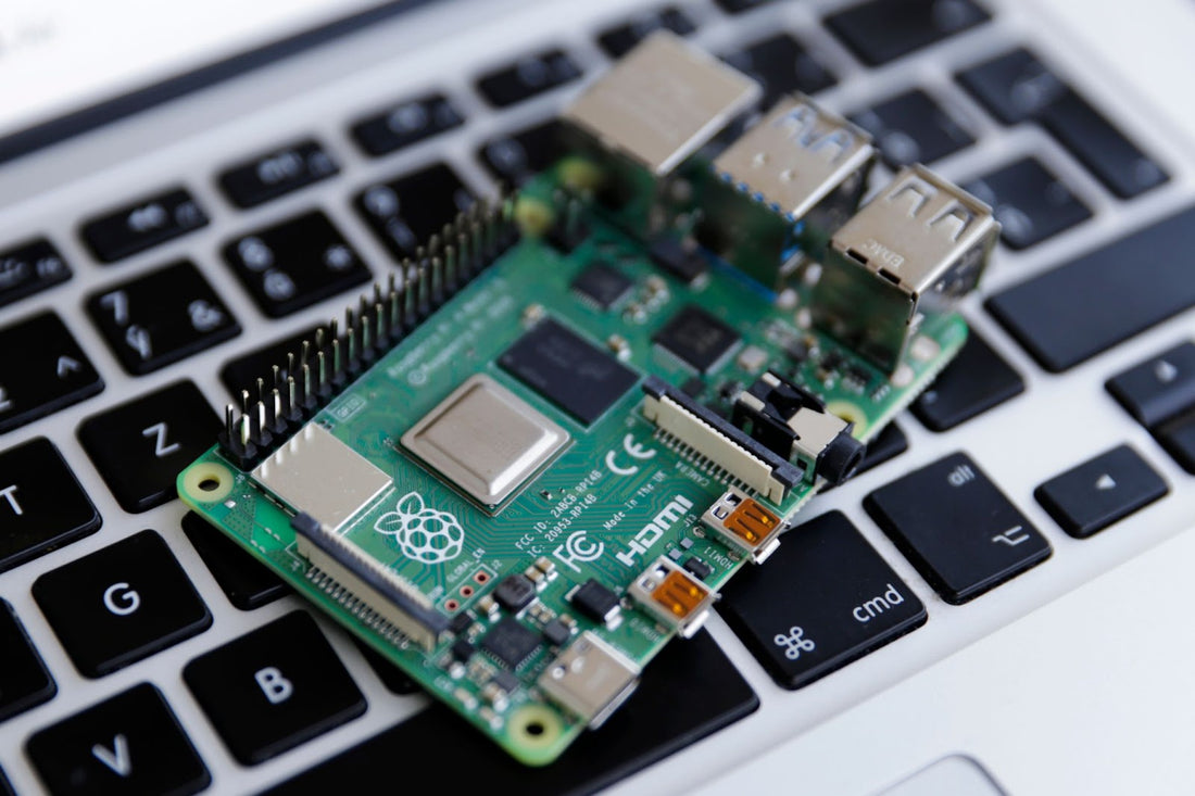 Raspberry Pi on laptop keyboard.