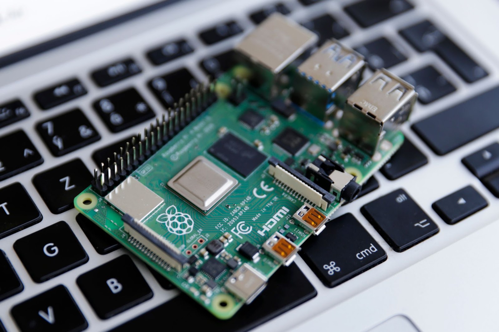 Raspberry Pi on laptop keyboard.